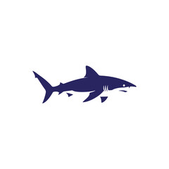 Silhouette of a Great White Shark swimming in the ocean.