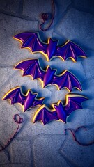 Bat-Themed Decorative Keychains against a Purple Background