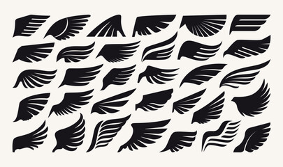 Wing logo. Eagle, hawk or phoenix angel feather, stylized tribal insignia falcon graphic. Vintage tattoo symbols. Black silhouette, logotype emblem isolated element. Vector abstract icons set