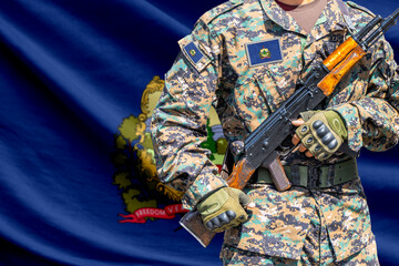 Fototapeta premium Vermont US state flag with soldier holding assault rifle