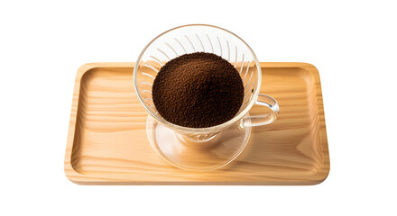 Rich, dark coffee grounds fill a clear pour-over dripper, ready for brewing a perfect cup.