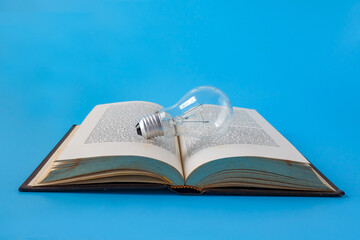 A light bulb on old books , Idea of learning, Education concept.