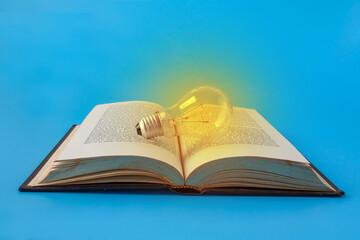 A light bulb on old books , Idea of learning, Education concept.