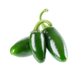 Fresh jalapeno pepper isolated on white background. Slices of green hot serrano pepper. Clipping path.