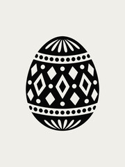 Ornate black and white easter egg with geometric pattern