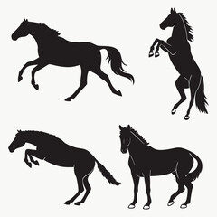 Fototapeta premium Four Black Horse Silhouettes in Various Poses animal