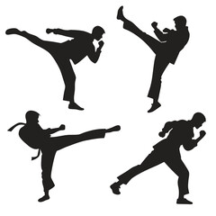 Four Silhouettes Of Men Performing Martial Arts Kicks
