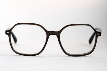 Eyeglasses front view. Black eyeglasses front view isolated on white background, stylish and modern accessory.