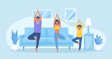 Father, mom and daughter do yoga and stretching. Sport activity with children. Morning Exercises at Home. Happy family doing fitness in cozy interior