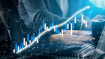 A business professional analyzes market trends using a laptop, featuring a financial chart overlay that represents growth and success in a modern office setting. Copula