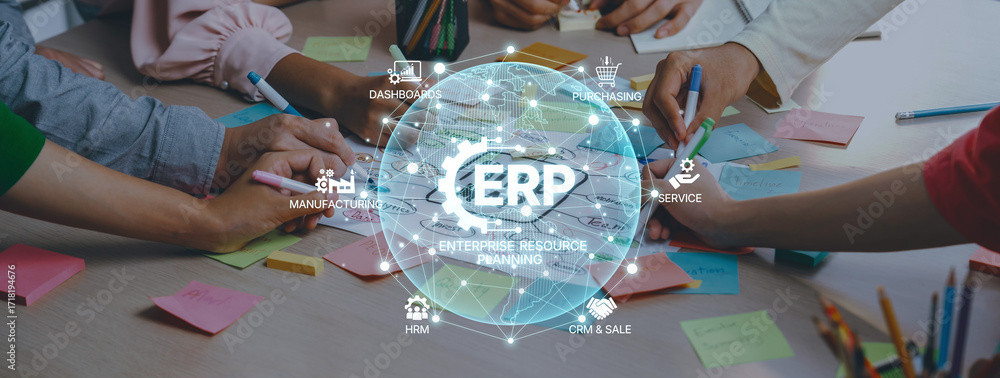 Poster a group of individuals collaboratively planning and brainstorming using erp systems. their hands are