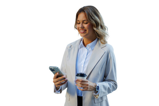 Professional businesswoman smiling, checking messages on smartphone while holding coffee cup, having a break - Powered by Adobe