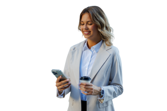 Professional businesswoman smiling, checking messages on smartphone while holding coffee cup, having a break