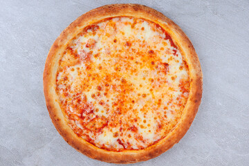 Classic Cheese Pizza with Melted Mozzarella and Tomato Sauce on Golden Crust over Gray Stone Background