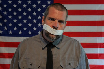 American Censorship Concept - Male Journalist or Politician - See no evil, Speak no evil, Hear no evil idea - Distracted Citizens