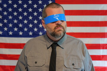 American Censorship Concept - Male Journalist or Politician - See no evil, Speak no evil, Hear no evil idea - Distracted Citizens