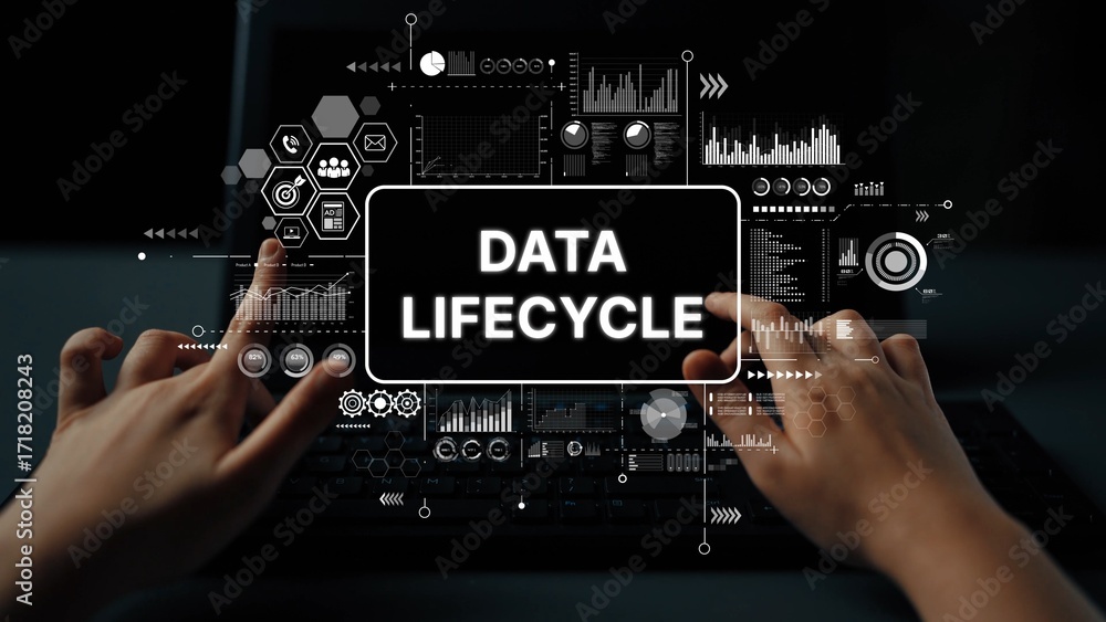 Poster hands on keyboard with digital data lifecycle graphics representing information flow and management 