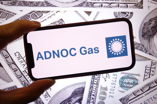 Konskie, Poland - September 21, 2025: ADNOC Gas company logo displayed on mobile phone