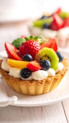 Sweet fruit tart with fresh berries and kiwi