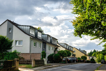 Residential Street with Houses in Summer