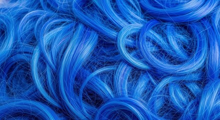 A close-up view of vibrant blue strands intricately curled and intertwined showcasing variations in color and texture across the surface