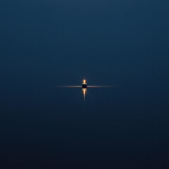Solitary Candlelight on Dark Water at Night