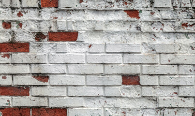 Brick wall with a white background and red bricks