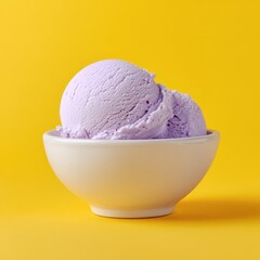 Two Scoops of Lavender Ice Cream in a White Bowl on Yellow Background