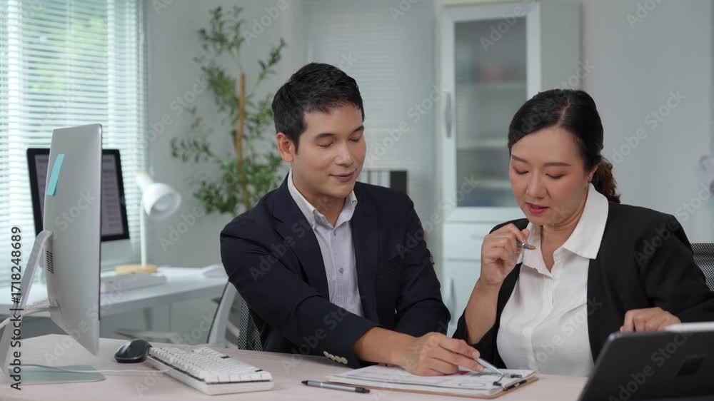 Poster professional asian business partners collaborating while analyzing marketing strategy, discussing pr