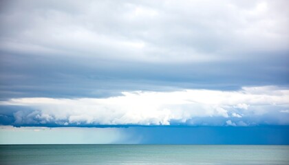 Fototapeta premium Cloudy Sky Over Water.