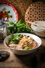 Noodle soup with sliced pork, pig blood, meatball and Thai morning glory,Nam Tok noodles