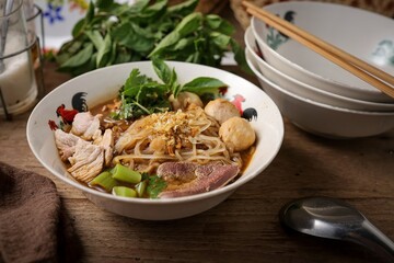 Noodle soup with sliced pork, pig blood, meatball and Thai morning glory,Nam Tok noodles