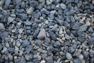 Closeup natural gravel stones texture background surface