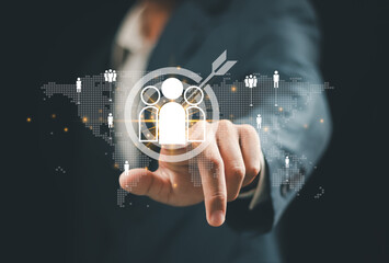 Businessman touching human icon with aim target. CRM, Customer Relationship Management. global structure customer network technology. Customer service, Social media, Digital marketing online, HR, HRM