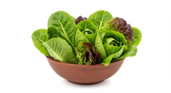 A brown ceramic bowl filled with fresh green and red lettuce leaves on a white background. - Powered by Adobe
