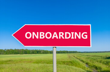 Onboarding success symbol. Concept word Onboarding on beautiful red road sign. Beautiful blue sky green grass and forest peaceful nature background. Business onboarding success concept. Copy space.