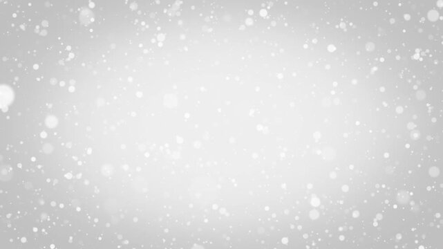 Abstract soft slow motion white particles animation. Christmas animated background. Seamless loop	