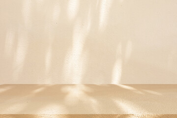 close up mockup studio with shadowing and light of beige plain concrete wall texture and tabletop for show product on display background concept