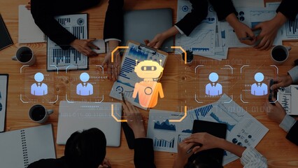 Diverse professionals collaborate in an office setting, utilizing digital tools and a robot assistant to analyze charts and foster productive discussions. Raster