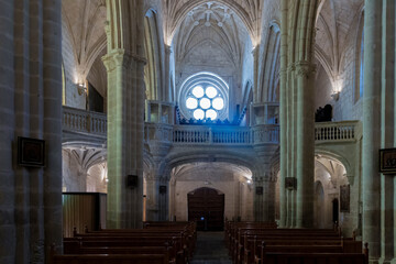 Trujillo church interior showing gothic architecture and pews