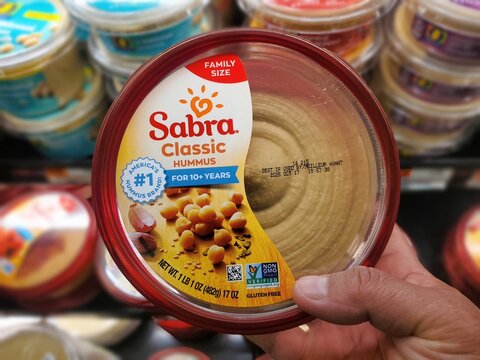 Wilmington, Delaware, U.S - Sept 16, 2025 - Sabra Classic Hummus, America's No 1 hummus brand, available in a family-size 17 oz container.
