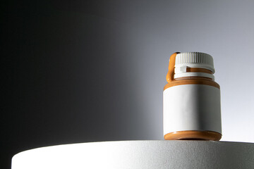 orange acrylic pours out of the bottle, acrylic for painting 