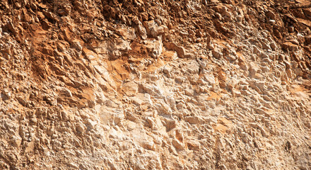 Natural limestone rock face texture for background