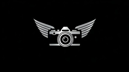 Fototapeta premium A camera eye logo with outstretched wings on both sides embodies the principles of creativity and freedom in visual arts