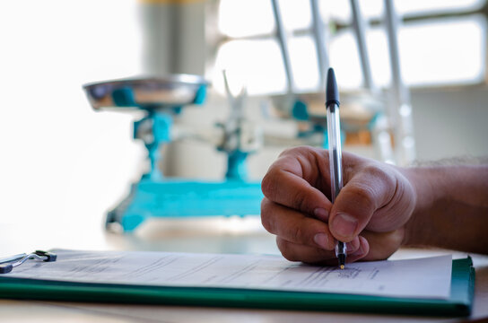 Hand of a man signing a document paper, insurance, legal contract or lawyer consulting. Disability people, attorney or advocate in negotiation, policy advice or accident report closeup - Powered by Adobe