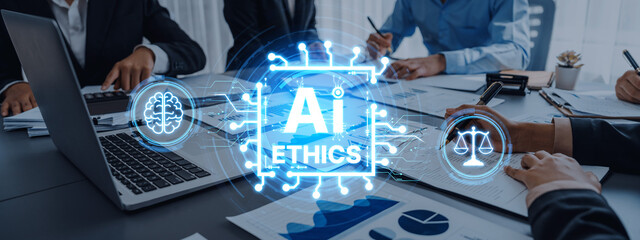 A professional business team engages in a strategic discussion about AI ethics, showcasing a laptop...