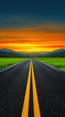 Naklejka premium A long, dark asphalt road stretches into a vibrant sunset over rolling green hills.