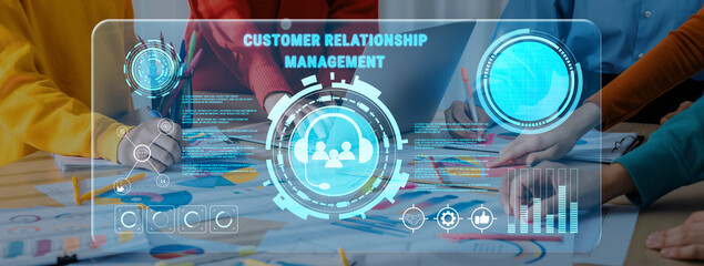 A dynamic business team engaging in collaborative customer relationship management strategy,...