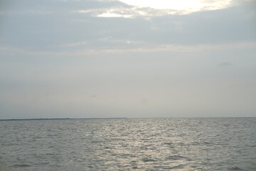 sea and sky. Calm Waters Under Cloudy Sky. 