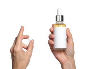 Close-up of hands holding a white pill and a clear glass bottle with a light-yellow liquid inside.  